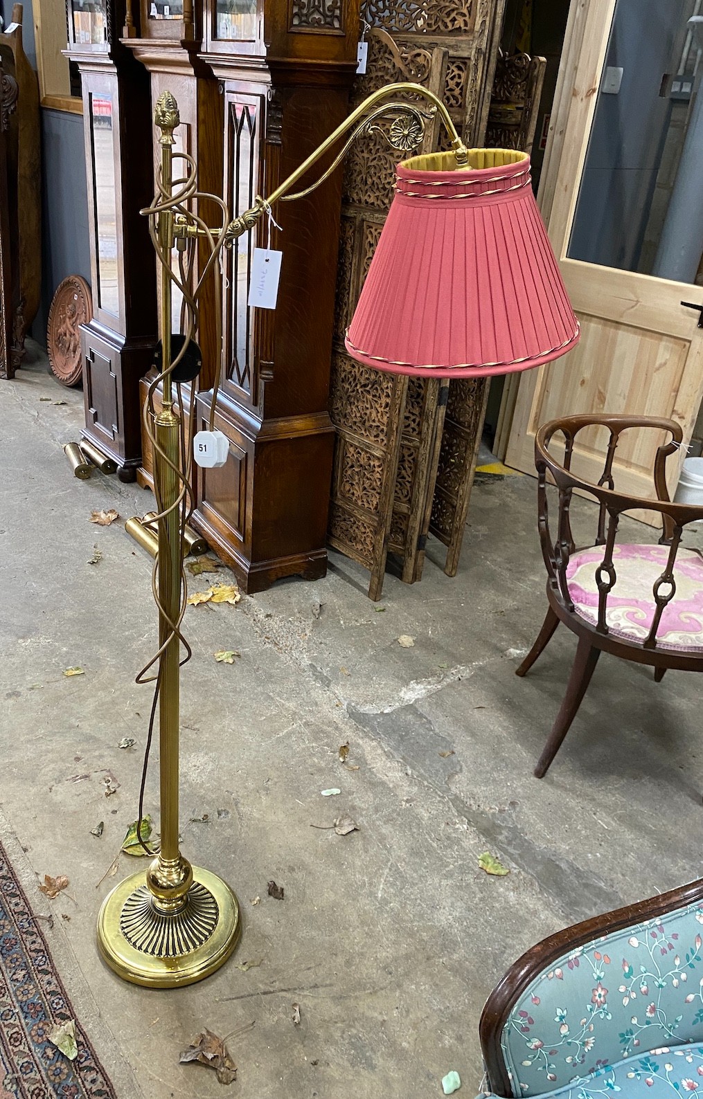 A Victorian style telescopic brass standard lamp
